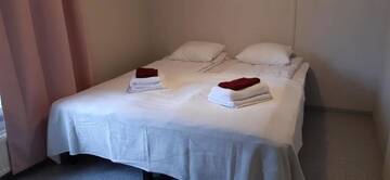Фото номера Двухместный номер с 2 отдельными кроватями и душем Хостелы Teemahostel г. Toivakka 10